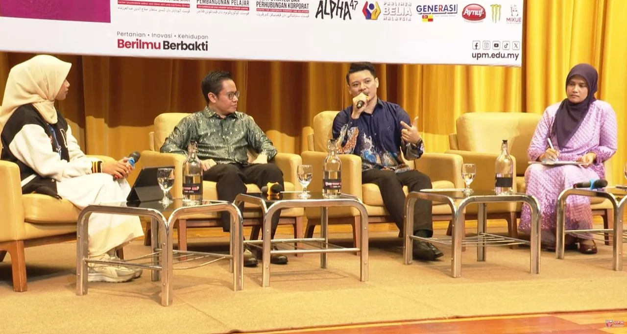 Nique speaking on a panel